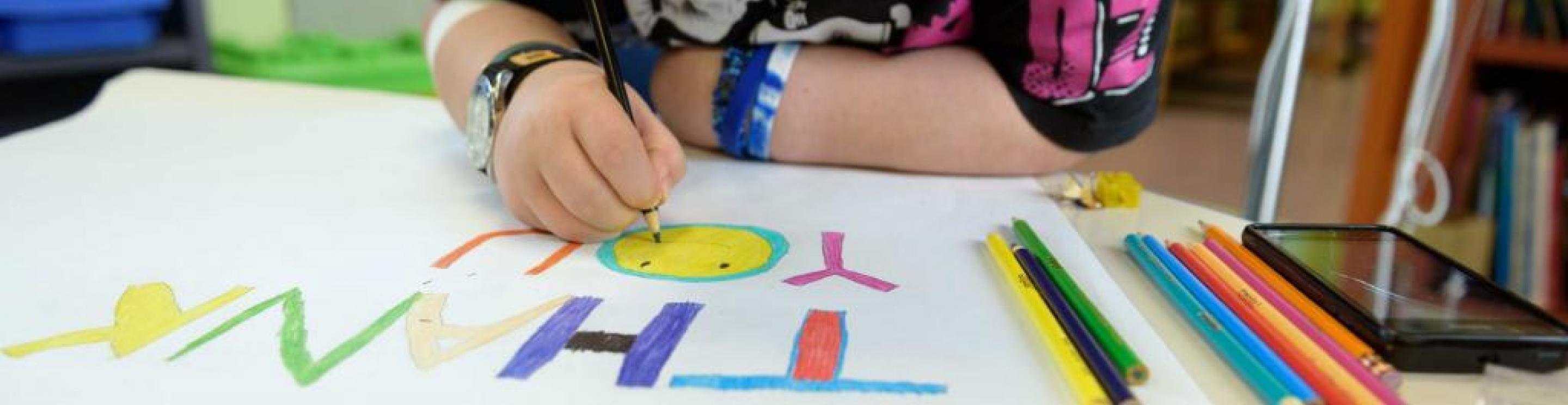 Closeup of a child colouring