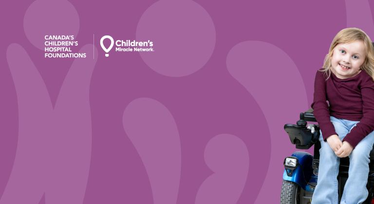 Ellis smiling at the camera.